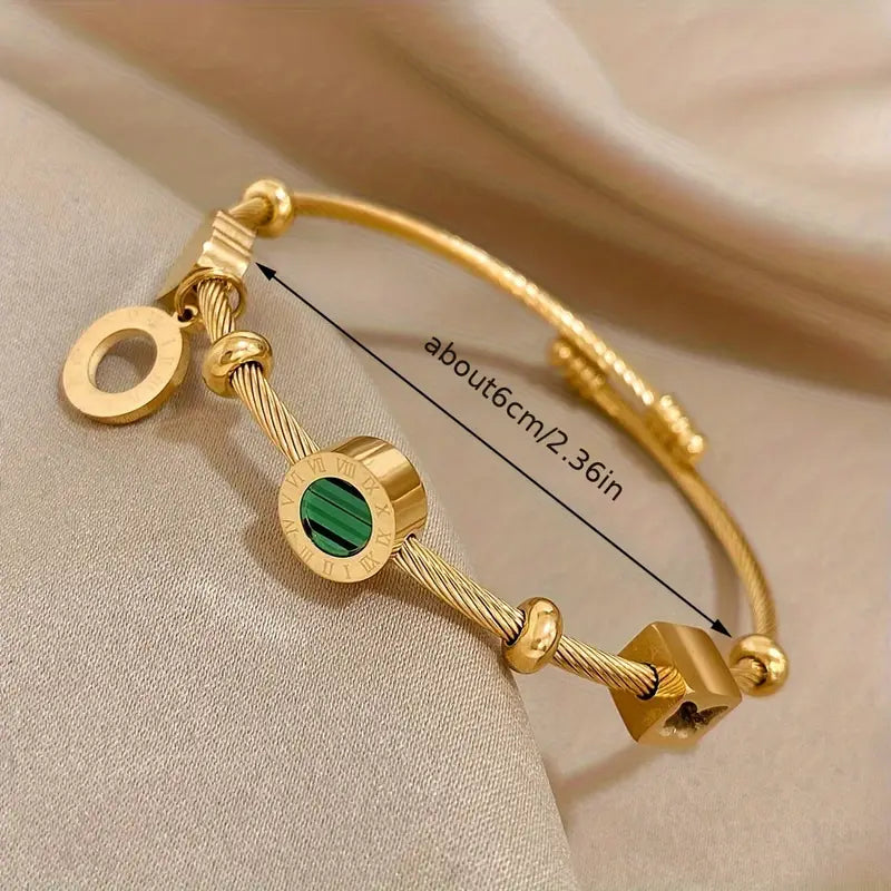 Bracelet rigide doré avec breloques géométriques - Celeste