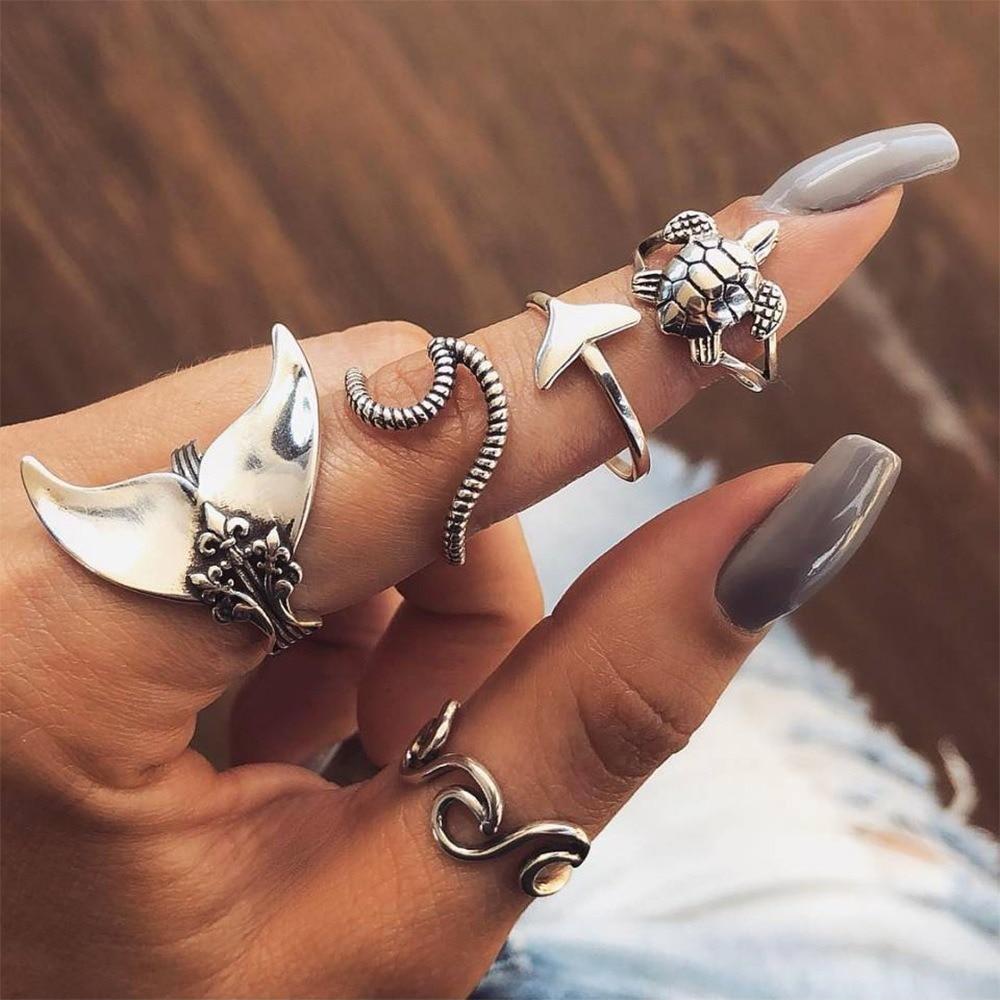 Lot de 5 anneaux de la mer en argent antique