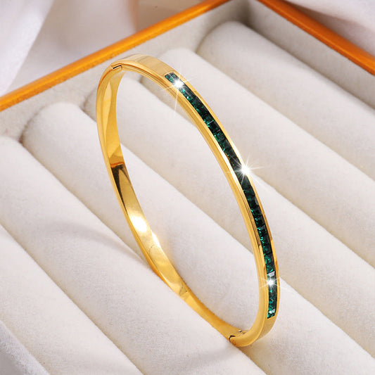 Bracelet rigide doré avec cristaux verts - Mirella