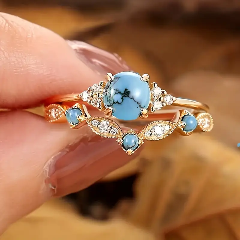 Bague en zirconium d'or avec opale bleue