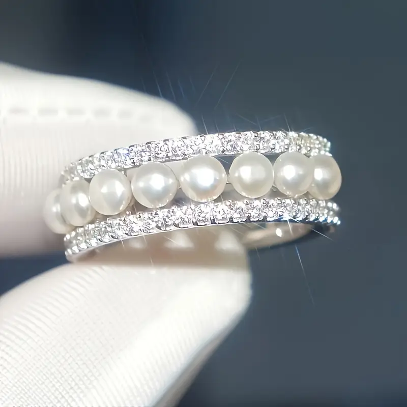 Bague vintage en argent avec perles blanches