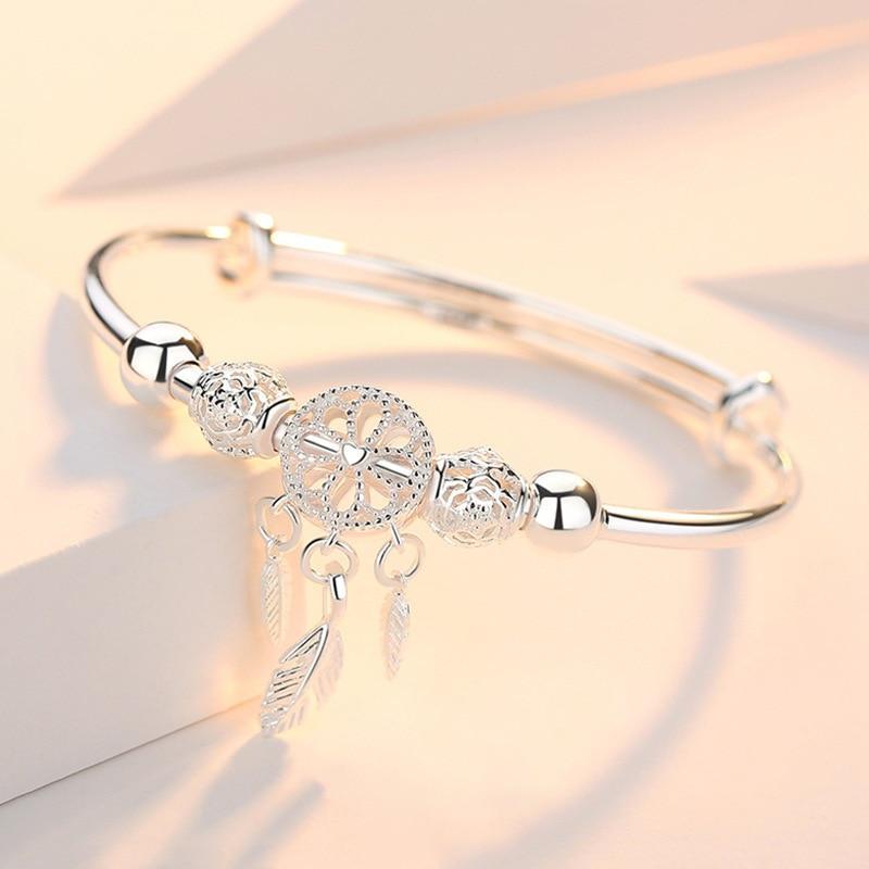 Bracelet rigide avec pendentif rêve et détails sculptés - Ismena