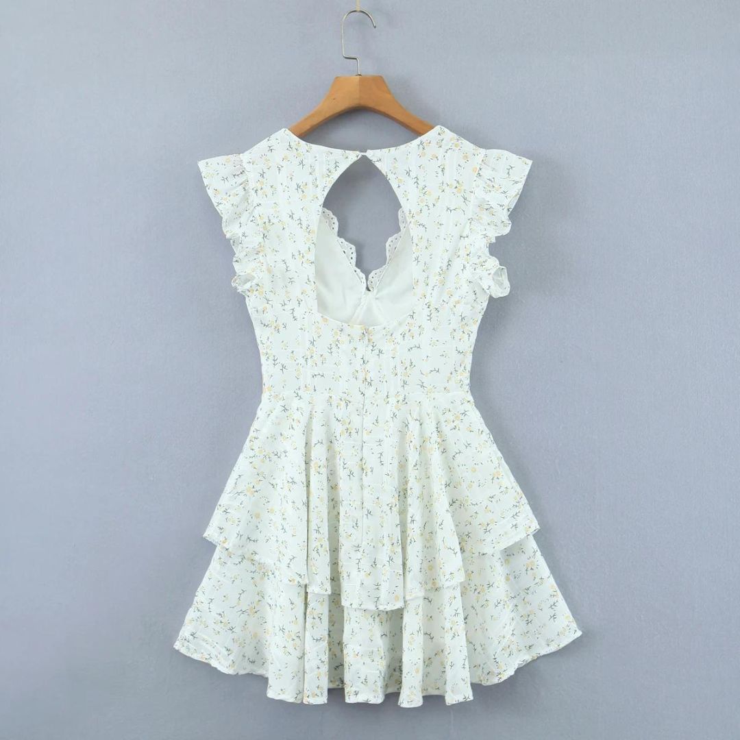 Lyra - Mini robe ludique avec broderie œillet