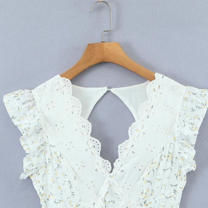 Lyra - Mini robe ludique avec broderie œillet