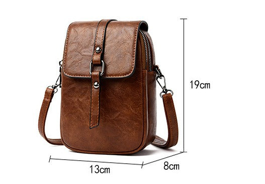 Sac à bandoulière en cuir synthétique pour femme avec poche frontale compacte - Daniela
