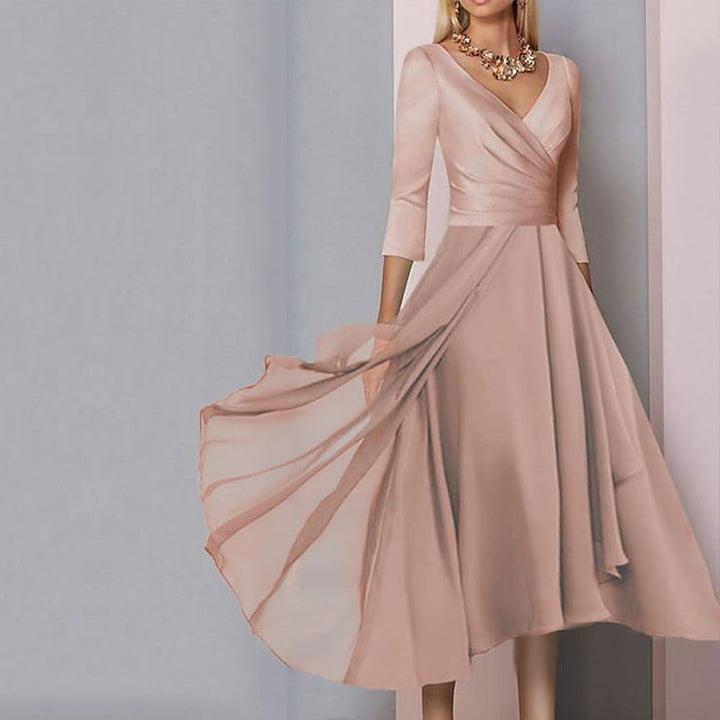 Maxine - Robe rose clair plissée manches ¾ maxi en A-ligne