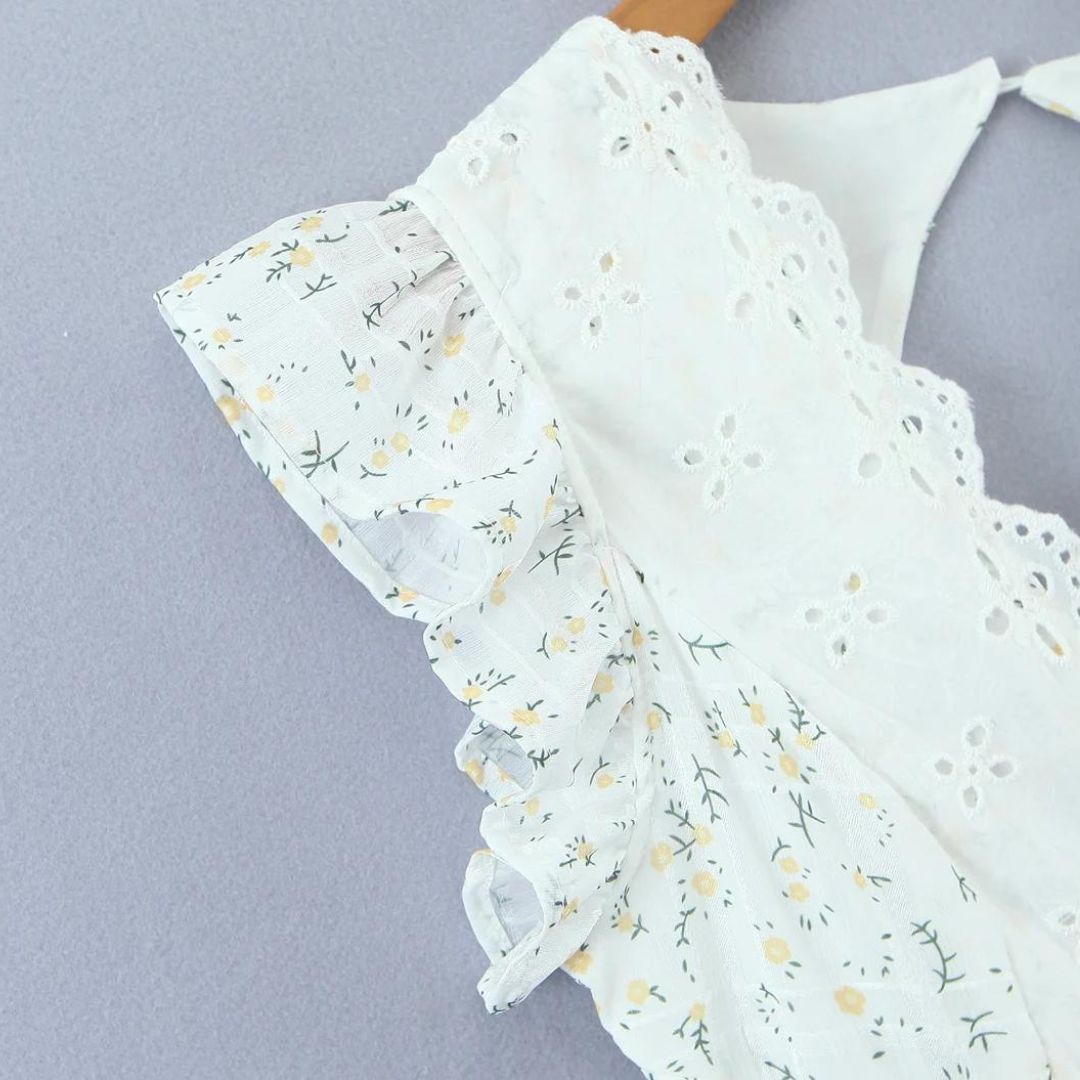 Lyra - Mini robe ludique avec broderie œillet