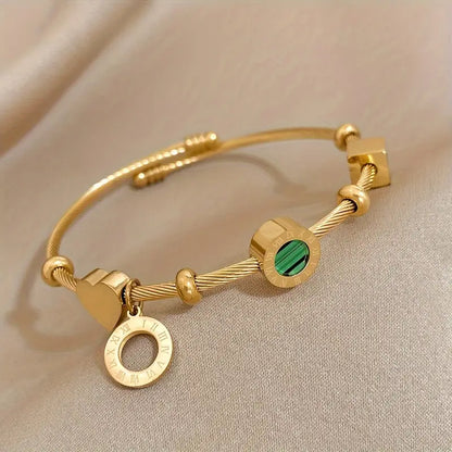 Bracelet rigide doré avec breloques géométriques - Celeste
