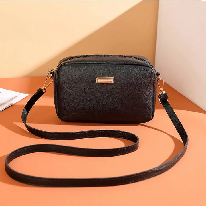 Sac à bandoulière en cuir synthétique pour femme au design minimaliste - Clara