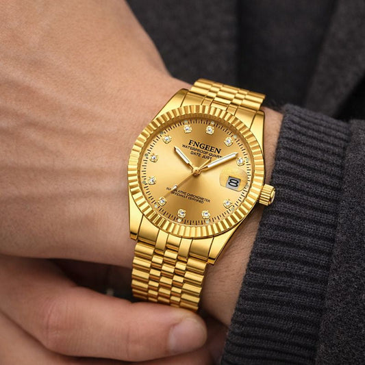 Montre Homme Acier Inoxydable Lunette Rainurée Or Avec Fenêtre Date Cadran Classique Repères Cristallins