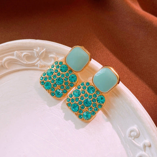 Boucles d'oreilles géométriques avec détails lumineux - Zephyra