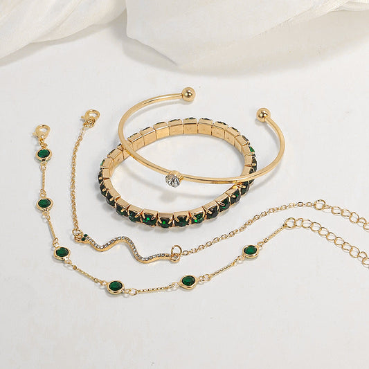 Jeu de bracelets en or avec détails verts - Smeralda