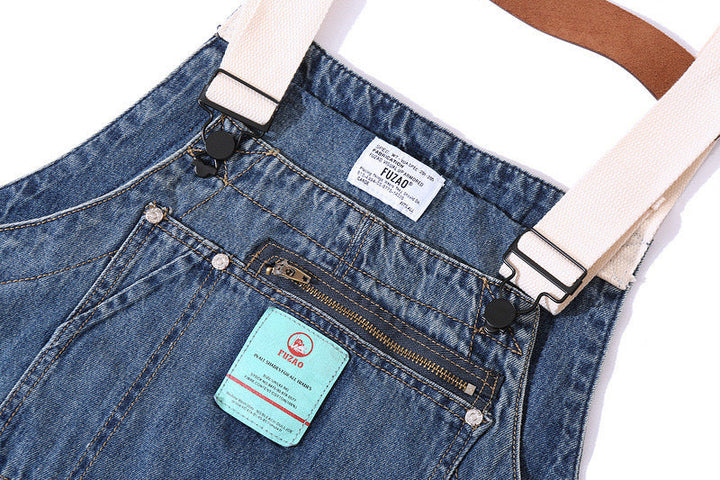 Salopette multi-poches à bretelles en denim vieilli