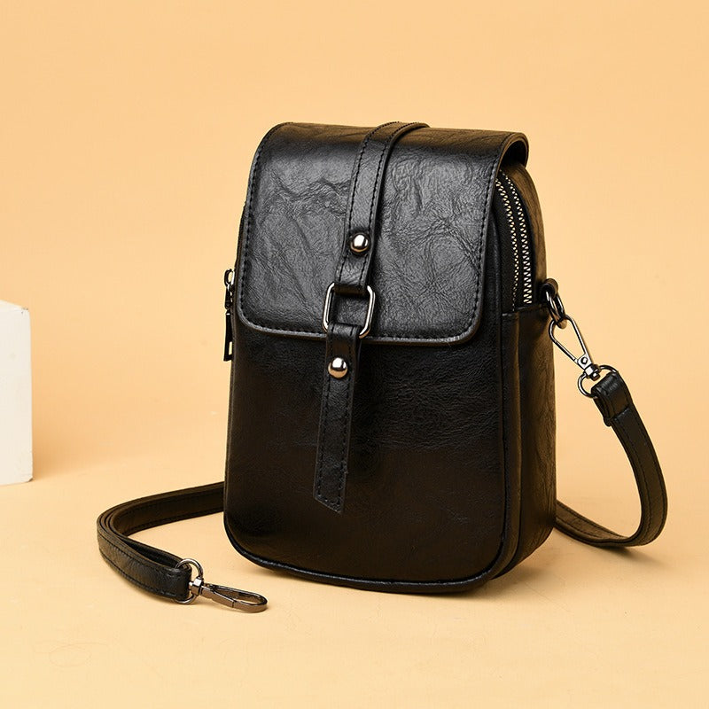 Sac à bandoulière en cuir synthétique pour femme avec poche frontale compacte - Daniela
