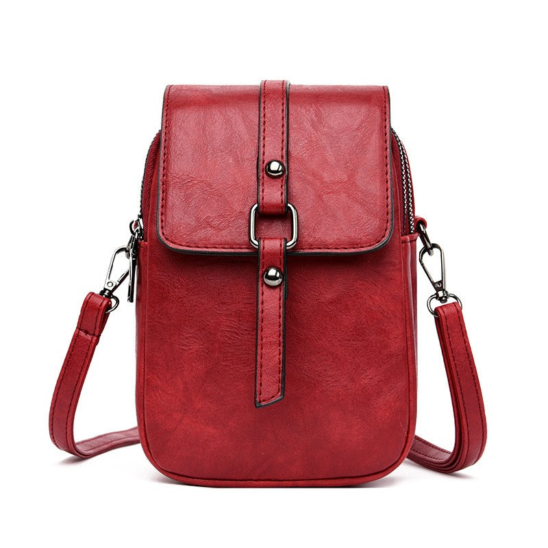 Sac à bandoulière en cuir synthétique pour femme avec poche frontale compacte - Daniela