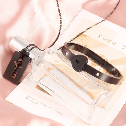 Parure couple cadenas et clé design cœur - Énclave