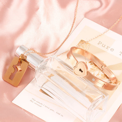 Parure couple cadenas et clé design cœur - Énclave