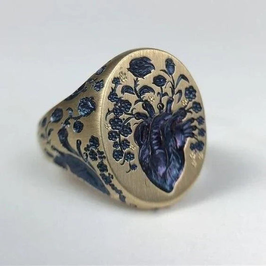 Bague vintage en or avec sceau floral bleu