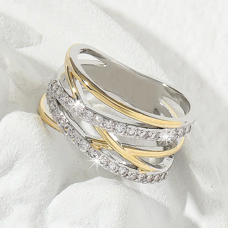 Bague superposée en or et argent avec zirconium brillant