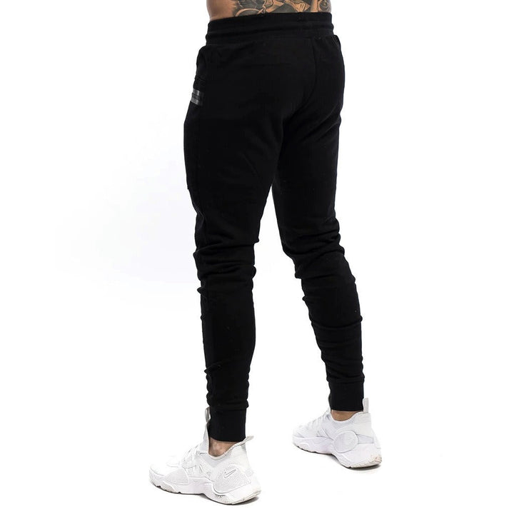 Pantalon de sport technique en maille pour homme, coupe slim - Finn