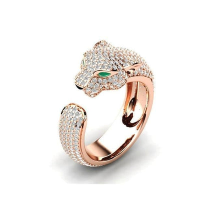 Bague réglable en argent et or rose 18 carats avec yeux en zircon vert